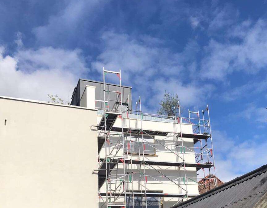 Steiger schilderwerk & renovatie pand in Mechelen