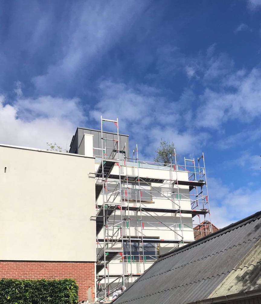 Steiger schilderwerk & renovatie pand in Mechelen